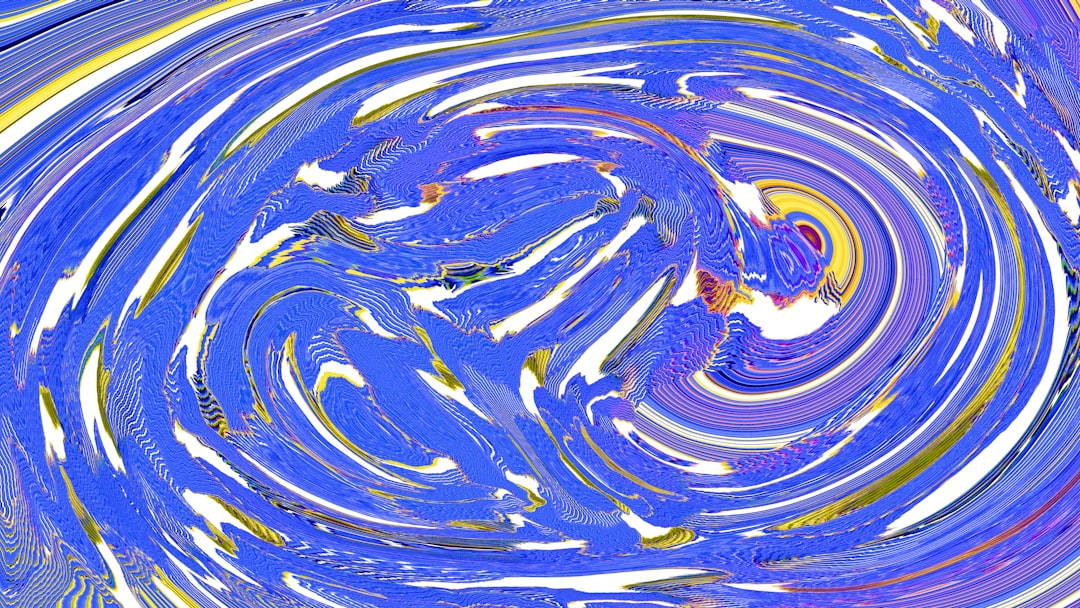 An abstract, swirling blue and white design.