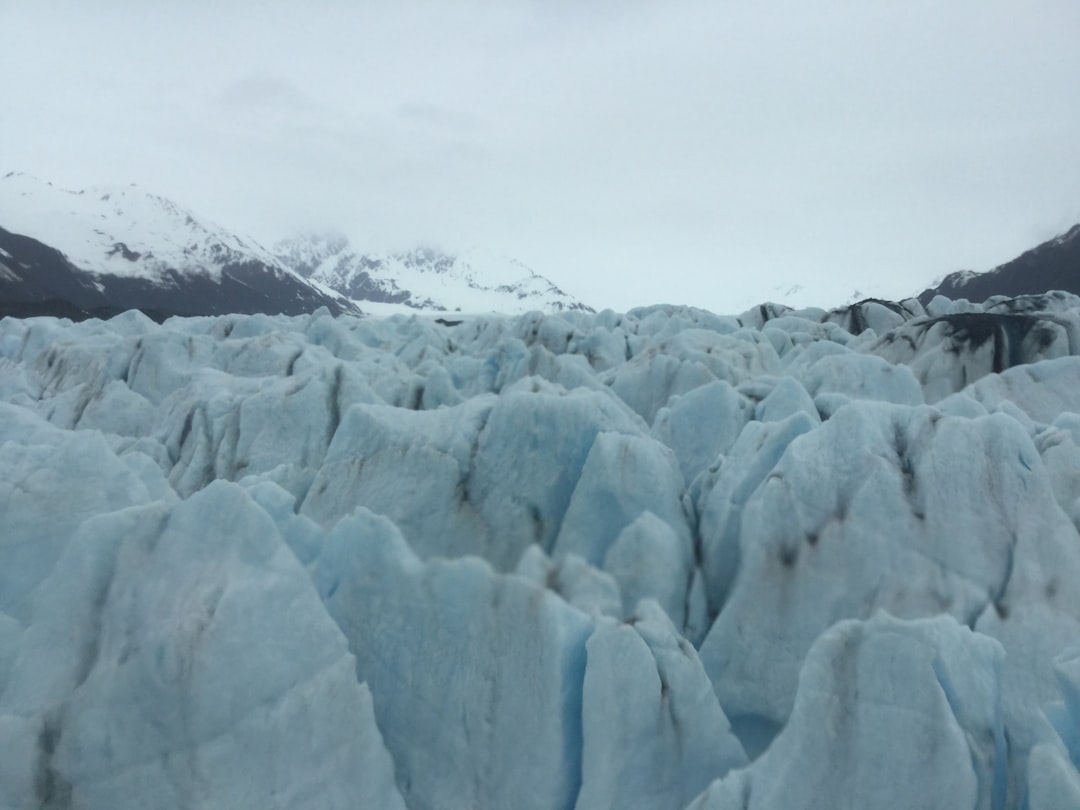 snow rocks under white sky