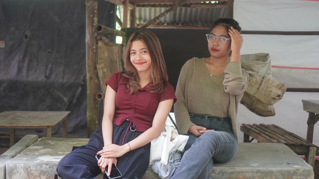 A man and a woman sitting next to each other