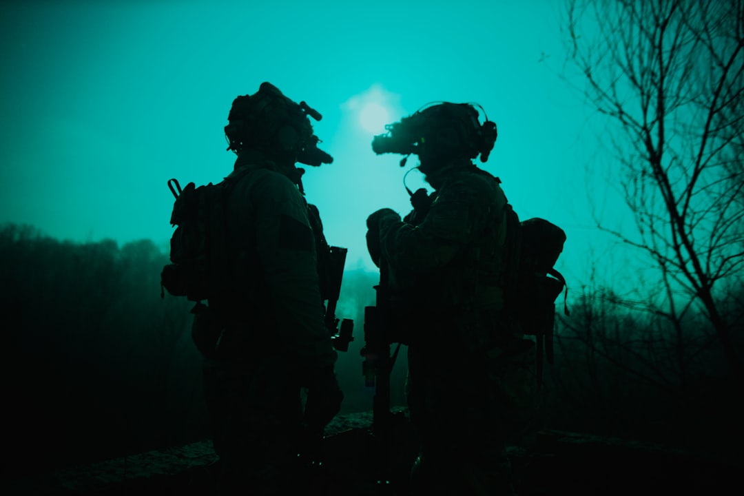 a couple of soldiers standing next to each other